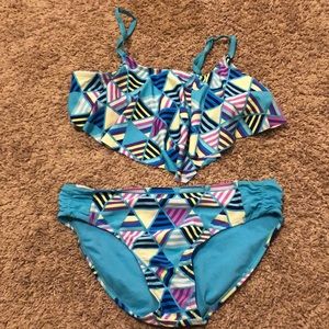 Geometric blue neon swimsuit from Justice. Size 18